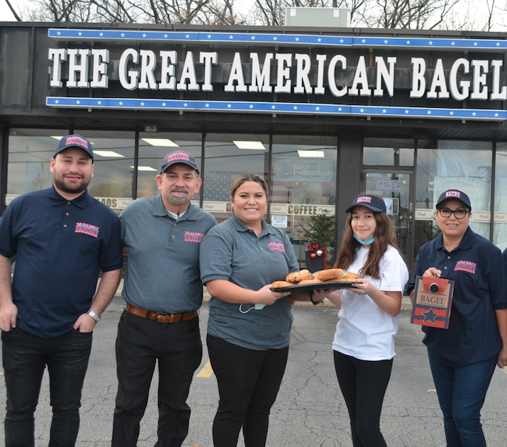 The Rios family plans to make The Great American Bagel shop at 12774 S. Harlem Ave. a go-to breakfast and lunch choice in Palos Heights and beyond. Pictured (from left) are Manny Jr. Manny Sr., daughter Silvia, Mia and mother Silvia Rios. --Photo by Cosmo Hadac