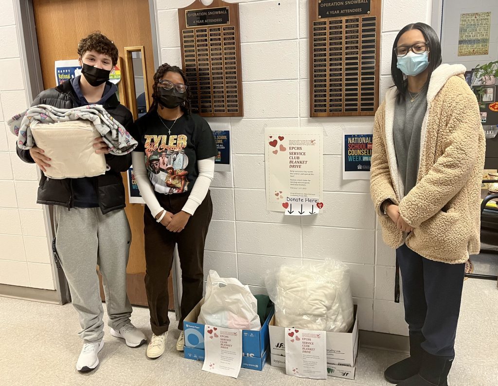 The Service Club at Evergreen Park Community High School, 9901 S. Kedzie Ave. in Evergreen Park, is hosting a blanket drive until February 11. From left to right: Jack Donnelly, 17, of Evergreen Park; Myah Johnson, 18, of Evergreen Park; and Gabby Smith, 17, of Evergreen Park. (Supplied photos)