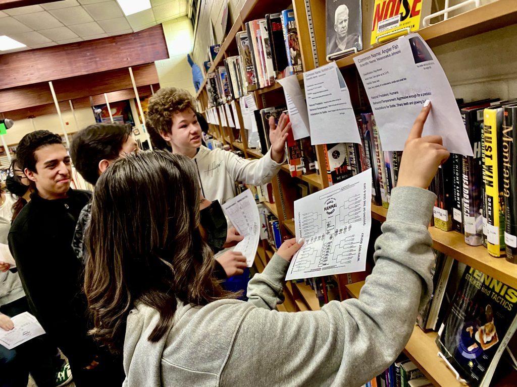 OLCHS students, Jocelyn DelValle, 14, of Oak Lawn; Juan Caudillo, 14, of Oak Lawn; Anthony Rodriguez, 15, of Hometown; and Seweryn Firek, 15, of Oak Lawn, picking their brackets for this year's March Mammal Madness. (Supplied photos)