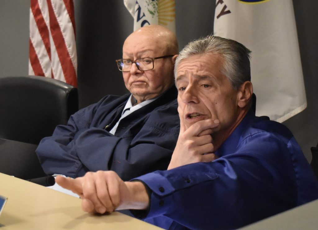 Lyons Village Trustee Paul Marchiori (right) voiced concerns about drivers’ safety on Ogden Avenue near a car wash that the board approved. Trustee James Veselsky is to the left. (Photo by Steve Metsch)