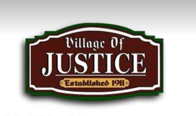 village of justice est sign