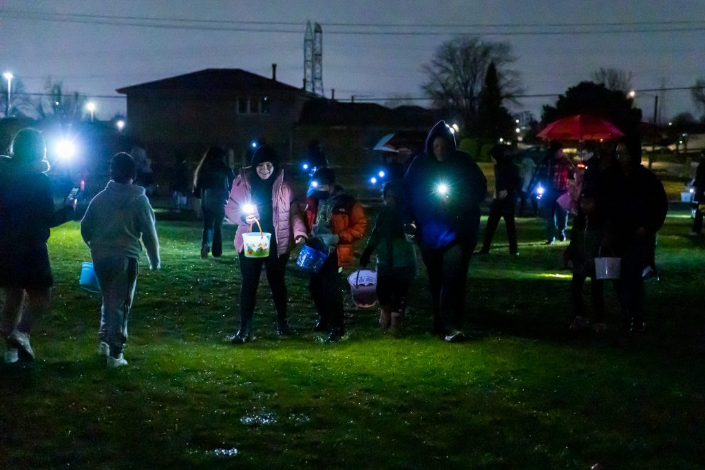 Visitors hunt for Easter eggs with flashlights at Bridgeview Park District's Commissioners Park on April 8. (Supplied photo)