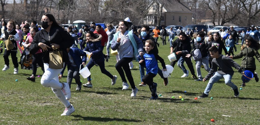 And they’re off! Hundreds of kids dash across Cermak Park during Lyons’ Easter Egg Hunt on Sunday morning. (Photos by Steve Metsch)