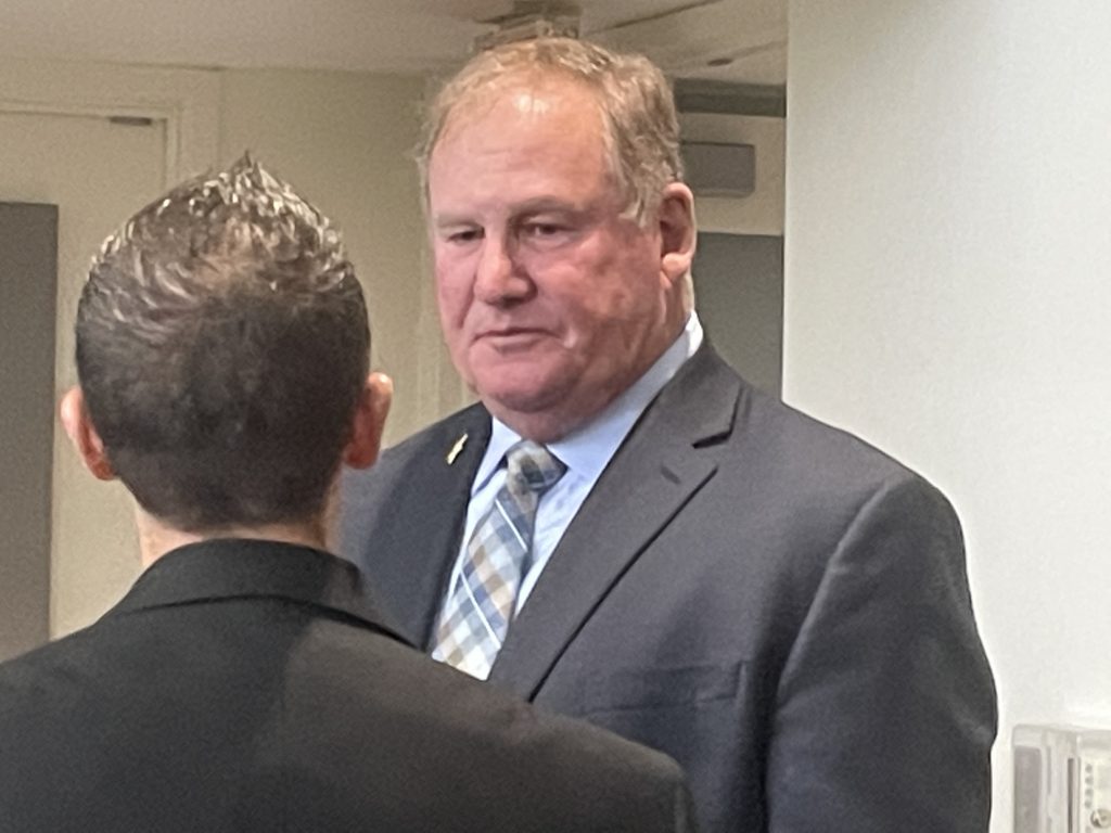 Former Orland Park police chief Tom McCarthy, shown at a May 2 village board meeting, has an Illinois football scholarship named in his honor. Photo by Jeff Vorva 