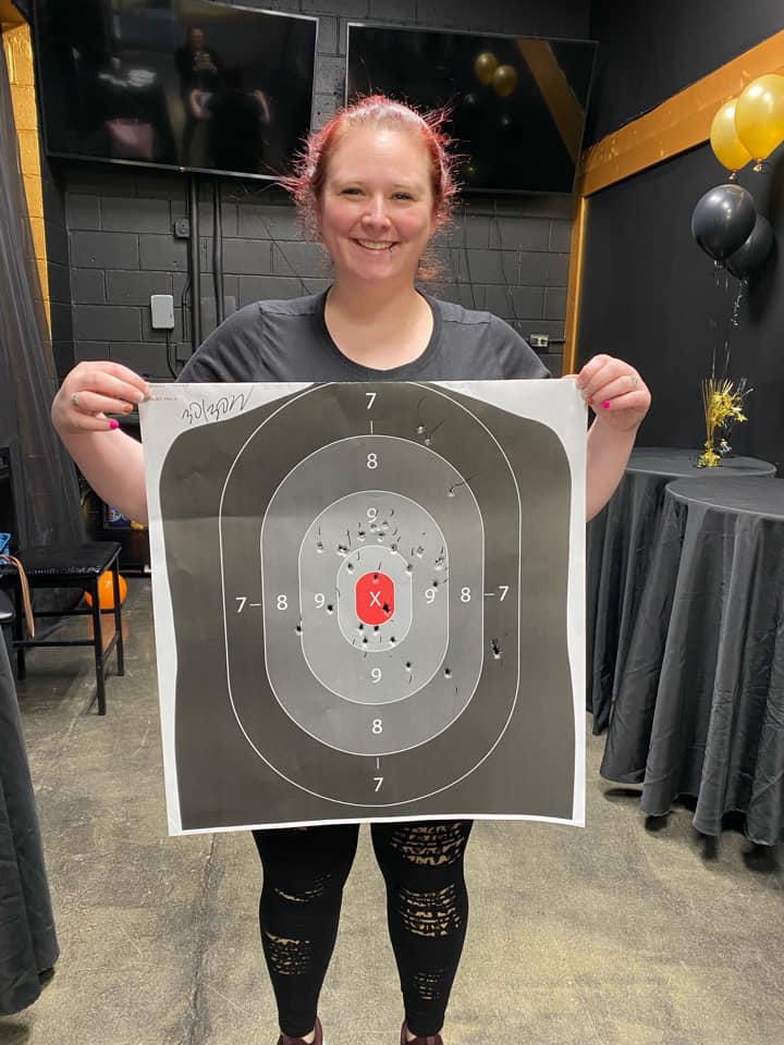 Southwest Sider Jessica Jendrzejak shows the results of her target practice during a recent women-only firearms training class held by Illinois Concealed Training. --Supplied photo