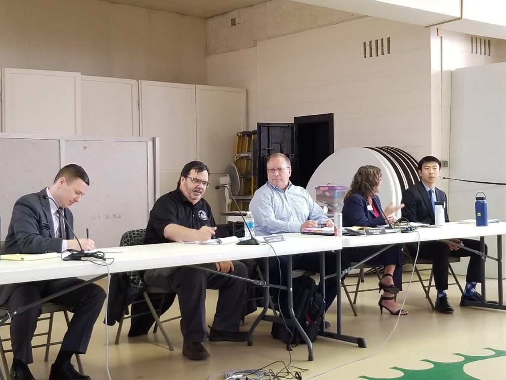 Indian Head Park Administrator John DuRocher (second from left), and Mayor Tom Hinshaw (third from left), along with presenters from Strand Associates, at the town hall meeting on April 26. (Photos by Carol McGowan)