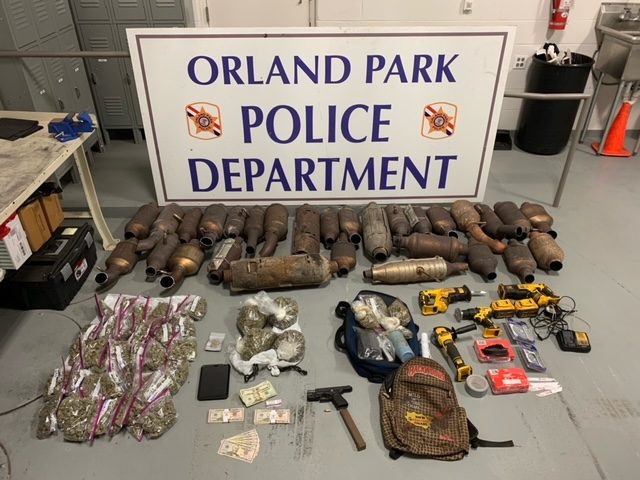 Orland Park police display catalytic converters, bags of cannabis, and a handgun seized after they arrested Donzel Jenkins. (Supplied photo)