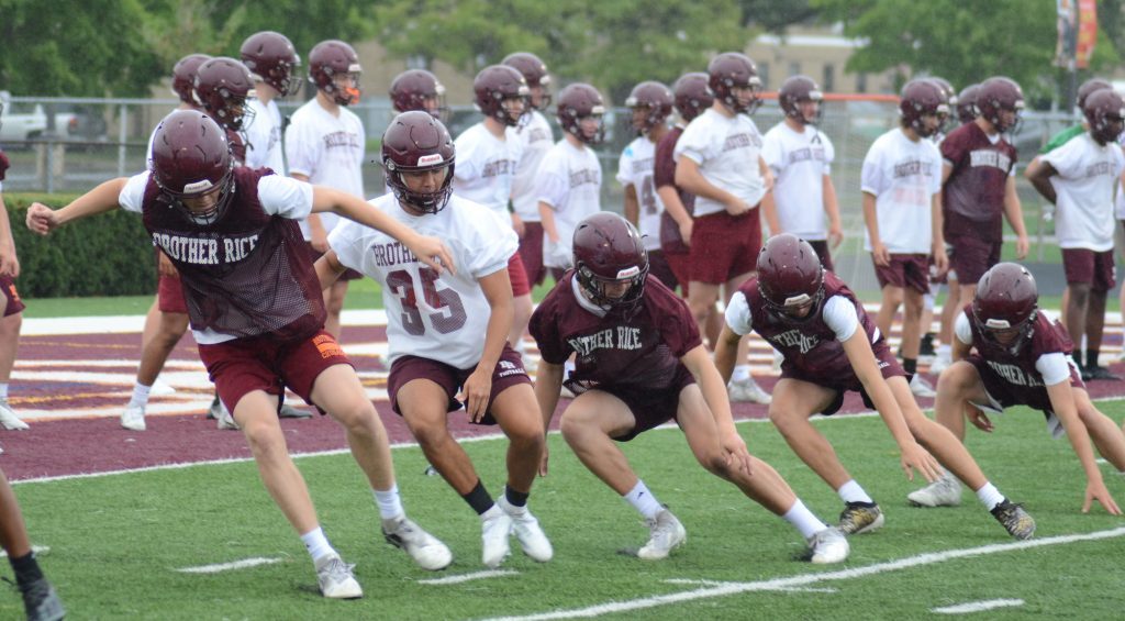 Brother Rice players go through their drills during the first day of football practice on Monday. Photo by Jeff Vorva