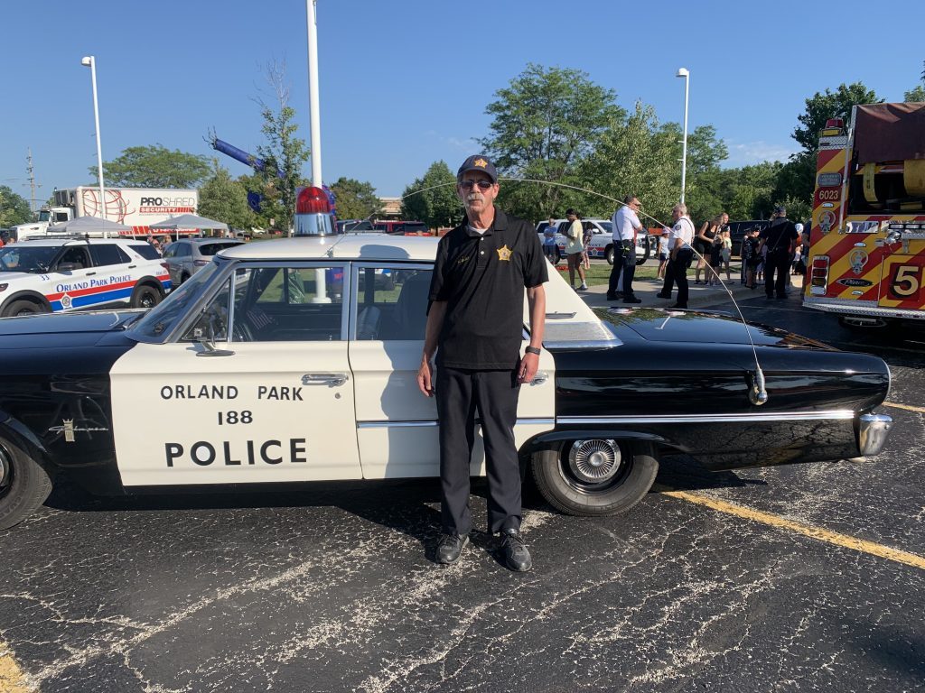 Michael Dalaly displays the authentic 1960s police car he and his friend and coworker Bill Duggan built from a 1963 Ford Galaxie. (Photos by Isabella Schreck)