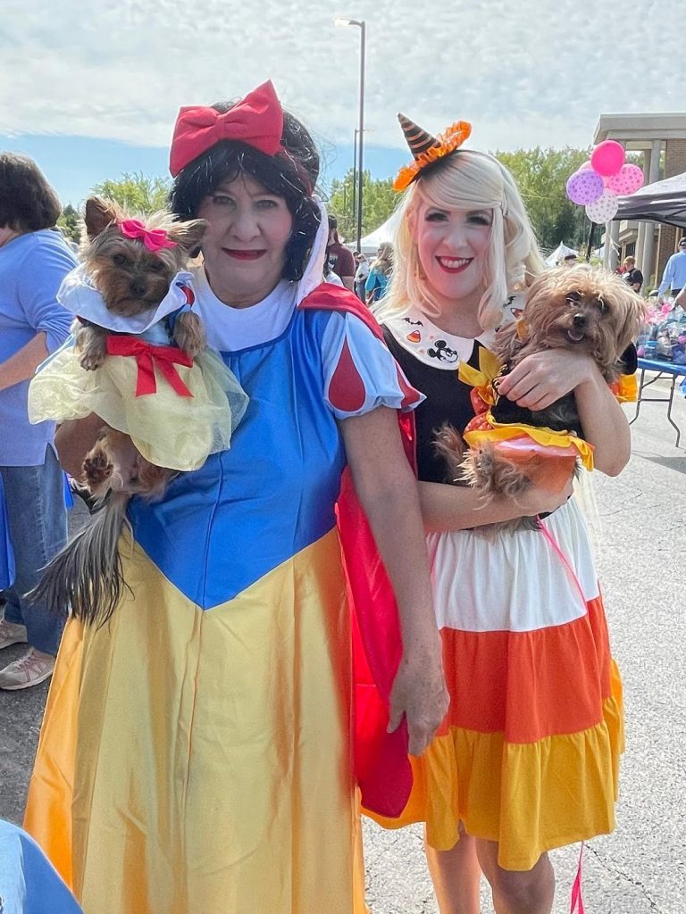 Pat Stuber,of Orland Park, and her daughter, Jaclyn, dressed as princesses for Orland Township's Pet-Palooza last year. They are pictured with their dogs, Tinkerbell, 2, and Pumpkin, 3.
