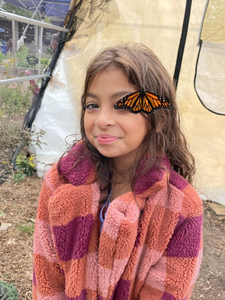 Livia Mitre, 9, of Beverly, was happy to be a part of Lake Katherine's Monarch Celebration.