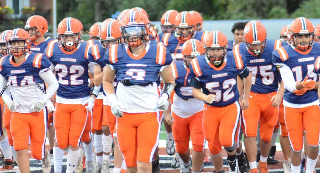 Stagg football players get ready to take on Lincoln-Way West on Friday night. Photo by Jeff Vorva