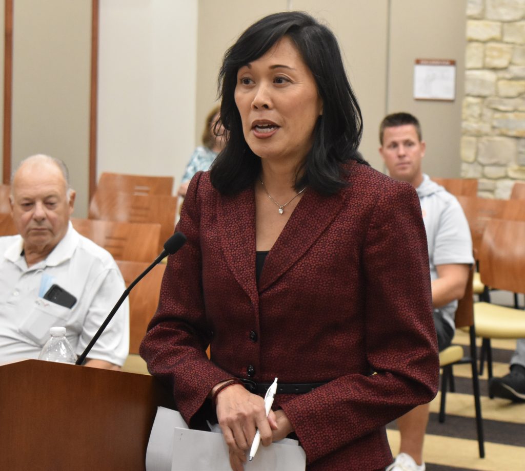 Grace Hou, Secretary of the Illinois Department of Human Services, addressed the Countryside City Council on Sept. 14 about asylum seekers. (Photo by Steve Metsch)
