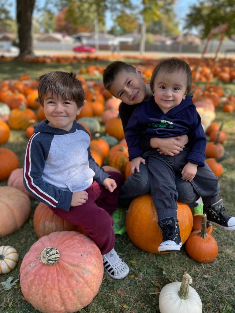 The Espinoza brothers, of Mount Greenwood, Conner, 3; Chase, 6; and Collin, 1, had fun at First United Methodist Church's Pumpkin Patch on October 9 at the church, 100th Street and Central Avenue, Oak Lawn. (Photos by Kelly White)