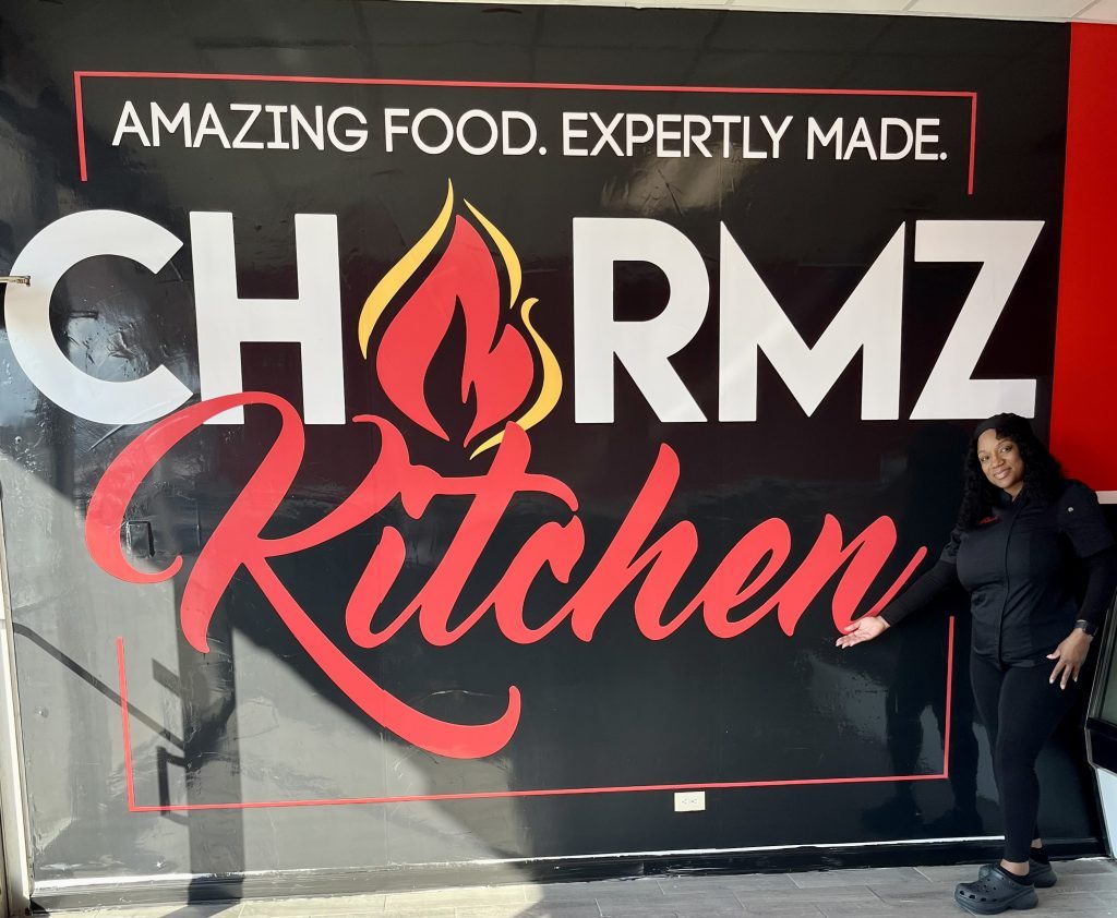 Charmaine Candler stands in front of her new restaurant in Country Club Hills. (Supplied photo)