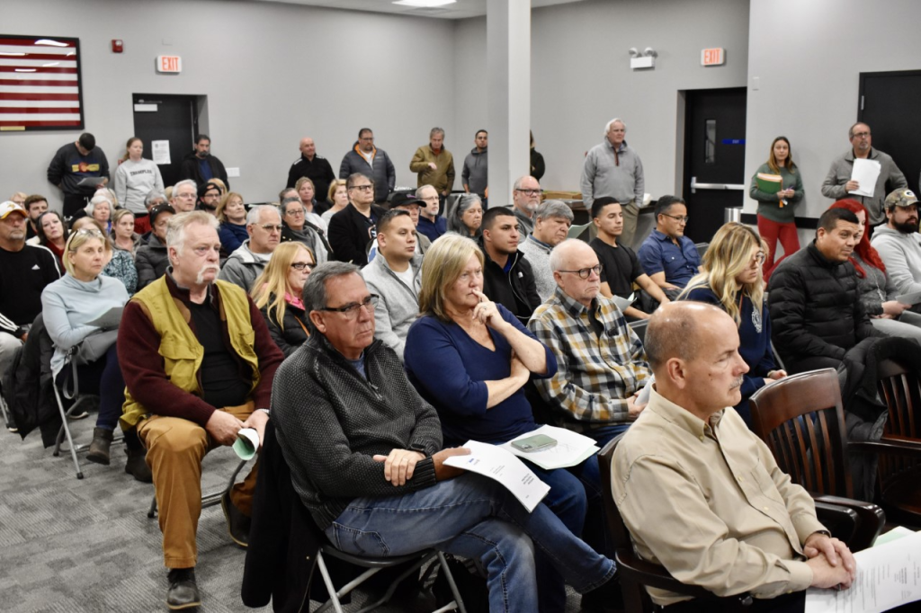 An overflow crowd of Township of Lyons residents attended a special meeting Nov. 14 about a plan to ease flooding. (Photos by Steve Metsch)