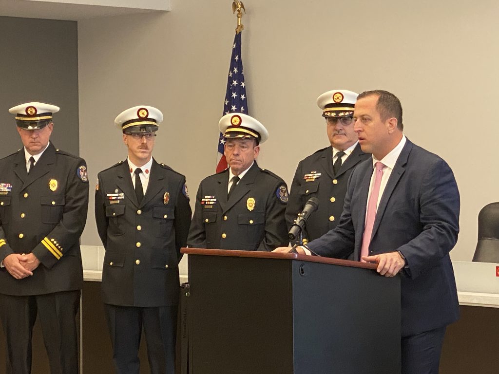 State Senator Michael Hastings discusses a new state grant that will speed up emergency communications among 51 fire departments. (Photo by Steve Neuhaus)