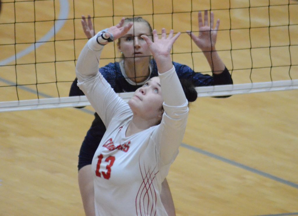 SXU sophomore Kaleigh Ritter, shown in a match earlier this year, had 63 assists in a five-set loss to Cornerstone in the NAIA national tournament. Photo by Jeff Vorva