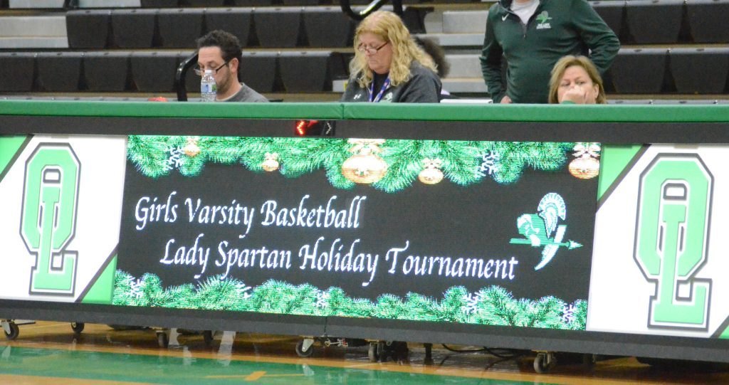 The sign that the holiday basketball season is here is at Oak Lawn, where the Spartans began hosting its tournament on Saturday. Photo by Jeff Vorva