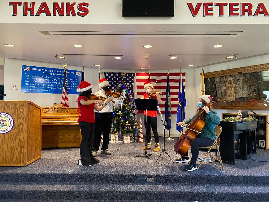 Four members of the Sandburg High School Symphony Orchestra volunteered at the Veterans' Home at Manteno spreading a bit of musical joy. (Supplied photos)