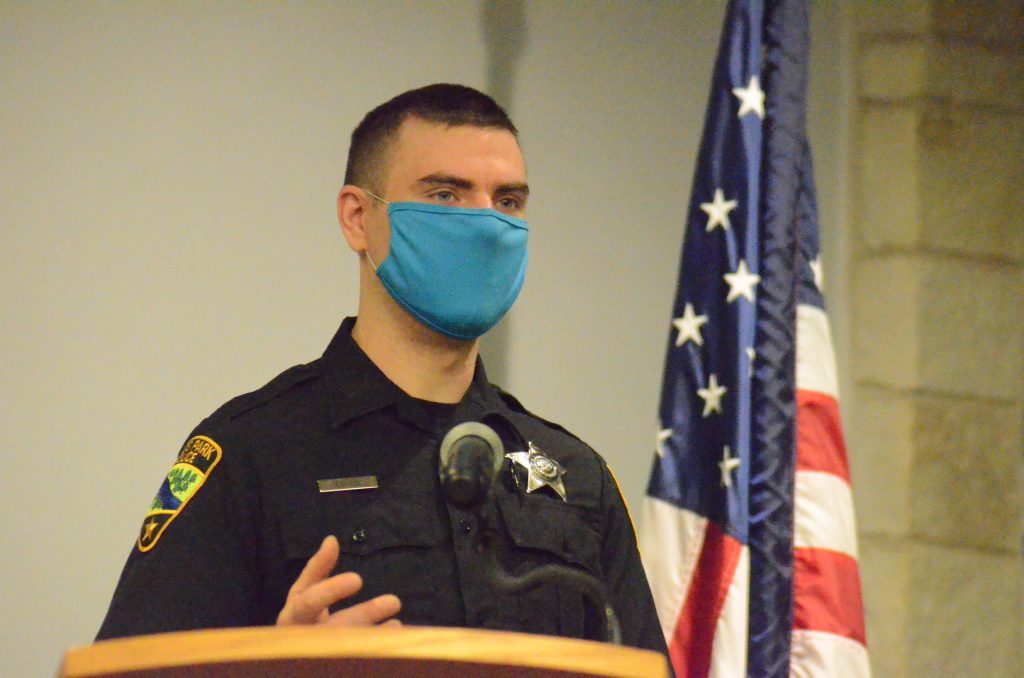Palos Park Police Officer Ross Chibe, shown at a village council meeting in 2021, and the Palos Park force are staying on top of a sextortion scam that has become prevalent. (Photo by Jeff Vorva)