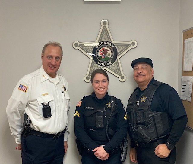 Stickney Police Chief James Sassetti (from left), Corporal Ashley McDonald, and Det. Sgt. Cruz Ortiz wearing new body cams. (Supplied photo)