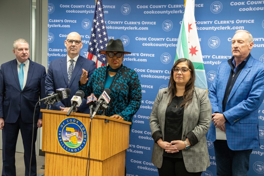 Cook County Clerk Karen Yarbrough is joined by Paul O'Grady (far right) and other elected officials to help recruit 1,000 Election Day poll workers. (Photo by Bryan Docter, Cook County Clerk's Office)
