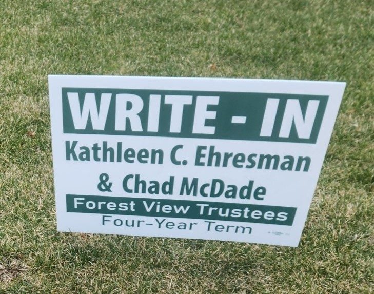 A political sign on a lawn in Forest View promoting the write-in campaigns on April 4. (Photo by Carol McGowan)
