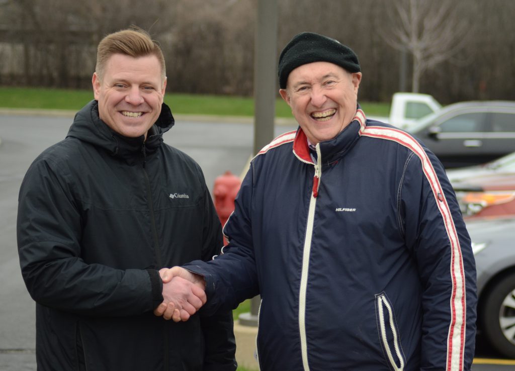 Brent Lewandowski (left) and George Popelka share a handshake on Election Day. (Photos by Jeff Vorva)
