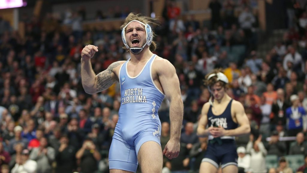 Austin O’Connor, a graduate of St. Rita, won his 2nd NCAA championship in March while competing for the University of North Carolina. Photos courtesy of UNC Athletics