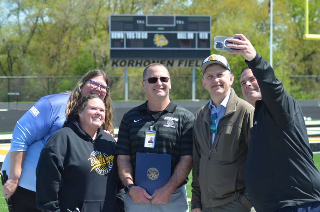 Special Olympics' Jennifer Kelso (from left), Richards' teacher Kelly Fleming Richards' Athletic Director Brian Wujcik and 6th District Congressman Sean Casten pose for a selfie orchestrated by District 218 Supt. Josh Barron at the Special Olympics regional on May 4. (Photos by Jeff Vorva) 