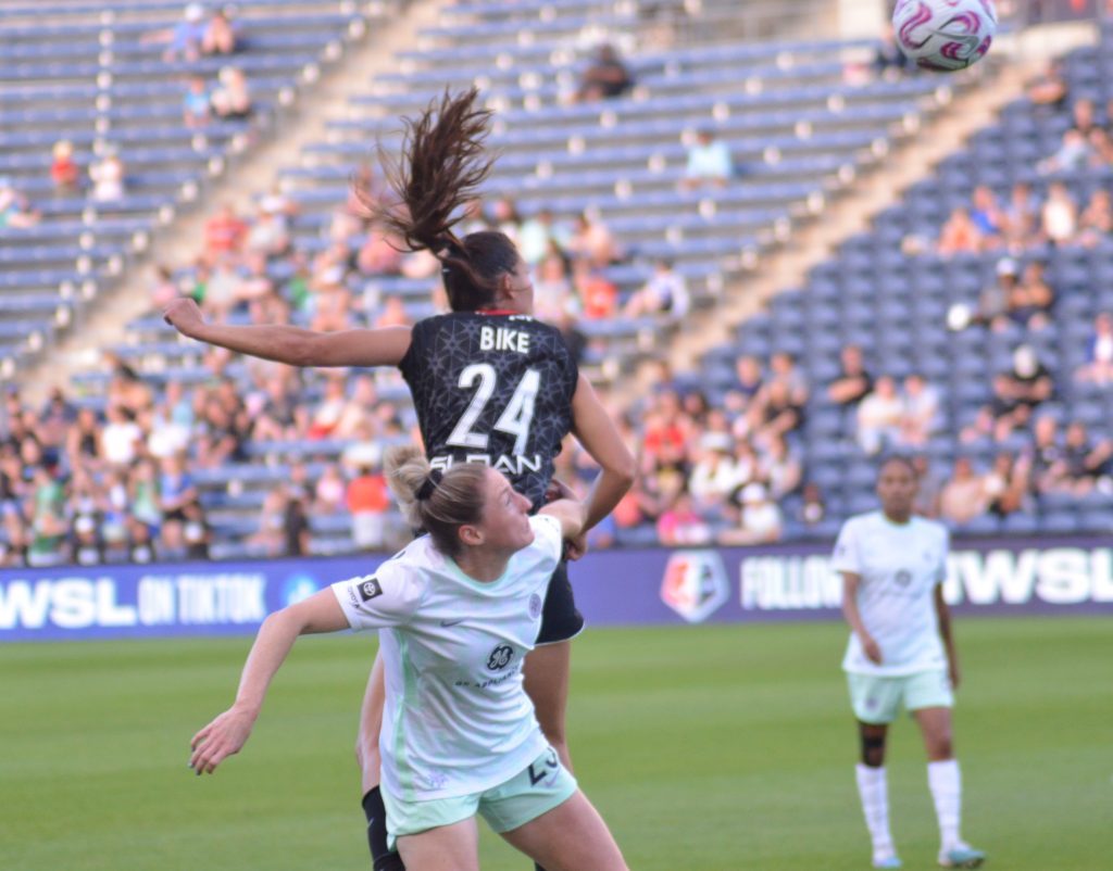 Chicago Red Stars rookie Jenna Bike executes a header against Racing Louisville on May 31. Photo by Jeff Vorva
