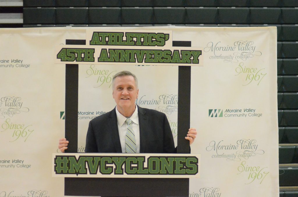 Moraine Valley Athletic Director Bill Finn, who is retiring on June 30, has a little fun last year during the athletic department’s 45th anniversary. Photo by Jeff Vorva
