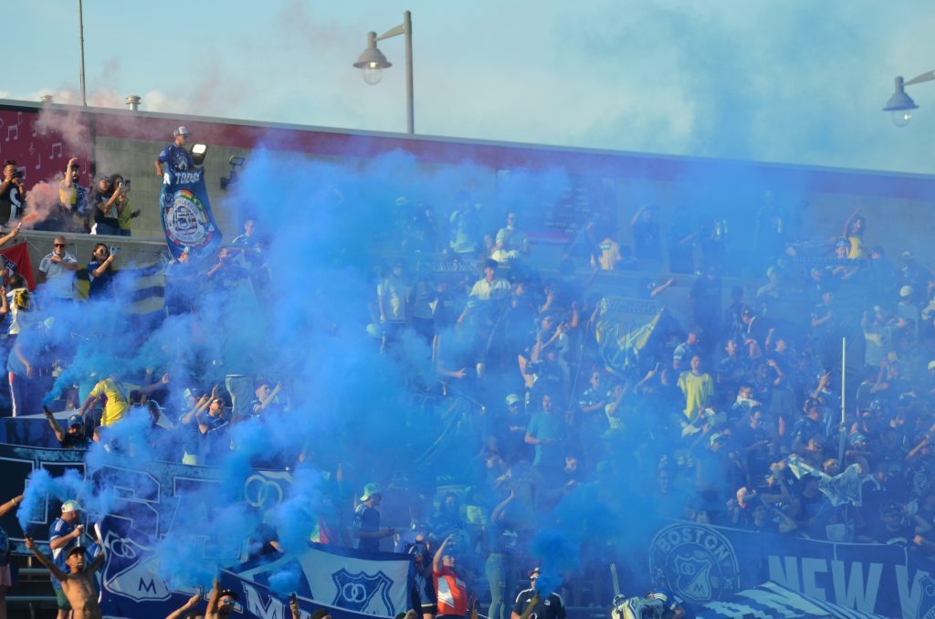 Fans of Colombia’s Millonarios teams let loose with a blue smoke bomb before its July 26 battle with Crystal Palace in Bridgeview. Photo by Jeff Vorva