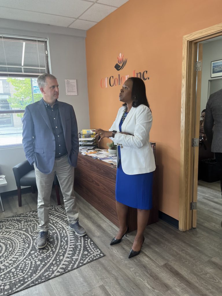 Cong. Sean Casten (D-6th) talks with Of Color board member Angela Whiteside-Smith Esq., an attorney from Orland Park, about why she got involved with the non-profit. (Photos by Dermot Connolly)
