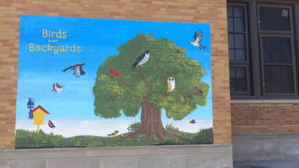 Several murals have been painted at locations throughout the Southwest Side, including this work entitled "The Birds in our Backyards" that can be viewed along the north side of Peck School, 3826 W. 58th St. The colorful mural depicts the various types of birds that can be seen in the neighborhood trees. Photo by Mary Stanek