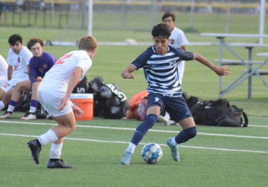 Reavis soccer player Ahmed Dhalai tries to use some fancy footwork against Lincoln-Way West in the Aug. 29 semifinals of the 32-team Windy City Classic. Photo by Jeff Vorva