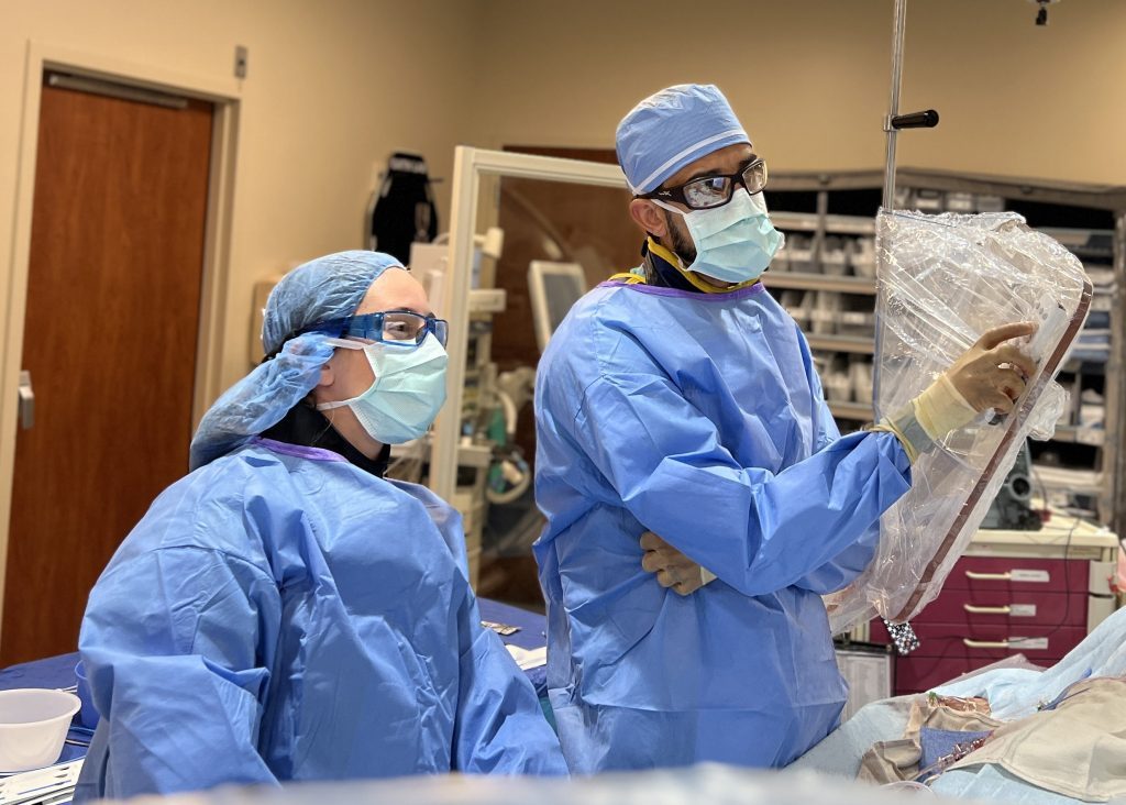 Melanie Franks, RTR, and Majed Afana, MD, interventional cardiologist, in the Cath Lab at Northwestern Medicine Palos Hospital. (Supplied photos)